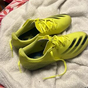 Used yellow Adidas soccer cleats